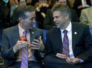 Del. S. Chris Jones, R-Suffolk, left, chairman of the House Appropriations committee, confers with House Majority Leader M. Kirkland Cox, R-Colonial Heights, right, before briefing  members of the House of Delegates on the new state budget during a meeting at the State Capitol in Richmond, Va., Tuesday, Feb. 23, 2016.  (AP Photo/Richmond Times-Dispatch, Bob Brown)