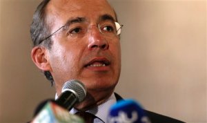 FILE - In this April 9, 2015, file photo, Mexico's former President Felipe Calderon speaks at a joint press conference one day before the Summit of the Americas in Panama City. Calderon on Saturday, Feb. 27, 2016,  joined his predecessor in office in unloading on Donald Trump, calling the Republican front-runners campaign racist and saying his discourse on immigration was sowing anti-American hate around the world. (AP Photo/Arnulfo Franco, File)