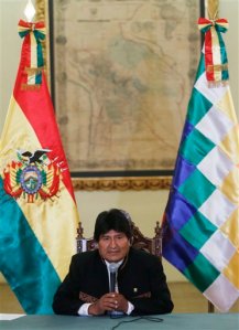 Bolivia's President Evo Morales speaks during a press conference at the government palace in La Paz, Bolivia, Monday, Feb. 29, 2016. Morales talked about Grabriela Zapata, his former lover who was working as a high-ranking executive at a Chinese firm, and who was arrested Friday 26. She has been part of a probe into alleged influence trafficking involving hundreds of millions of dollars in government contracts. (AP Photo/Juan Karita)