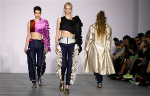 A model displays a design during the Fyodor Golan Autumn/Winter show at London Fashion Week, Friday, Feb. 19, 2016. (AP Photo/Kirsty Wigglesworth)