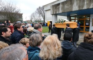 FILE - In this Friday, Feb. 12, 2016 file photo, The coffin of Giulio Regeni arrives at the church for his funeral service in Fiumicello, Northern Italy. Egypt on Monday, Feb. 15, 2016 denied reports that an Italian doctoral student doing research in Cairo was arrested shortly before his death and said an investigation into Regeni's killing is continuing with full Italian collaboration. (AP Photo/Paolo Giovannini, File)