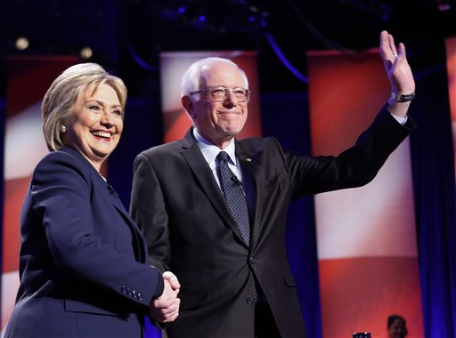 Dems up the decibels in NH debate; Wall Street a common&nbsp;foe
