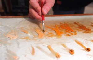 A Jan. 19, 2016 photo shows wildlife artist Robert Louis Caldwell working in his home studio in Chesterfield County, Va.  (Joe Mahoney/Richmond Times-Dispatch via AP)