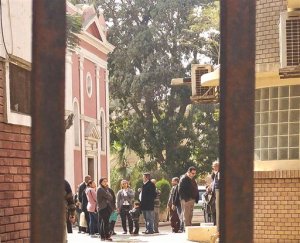 Mourners gather at a church at the Italian Hospital in Cairo for a private mass for slain Italian graduate student Giulio Regeni on Friday, Feb. 5, 2016. Regeni, a 28-year-old Cambridge University PhD candidate who had been researching labor rights in Egypt, went missing on Jan. 25, the fifth anniversary of the popular uprising that toppled longtime autocrat Hosni Mubarak. His body was found Wednesday bearing signs of torture. (AP Photo/Belal Darder)
