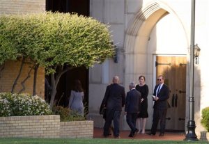 People arrive for the memorial service for sisters Nika and Michela Kholodenko at Arlington Heights United Methodist Church in Fort Worth, Texas, Tuesday, March 22, 2016. Sofya Tsygankova, the estranged wife of internationally renowned pianist Vadym Kholodenko, sought mental treatment the day before their two young daughters were found dead in the family's North Texas home, police said Tuesday. Tsygankova is accused of capital murder in the deaths of Nika, 5, and Michela, 1. (Joyce Marshall/Star-Telegram via AP) MANDATORY CREDIT