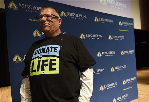 Morris Murray, previous liver transplant recipient, recounts his experience awaiting liver transplant surgery, during a news conference at Johns Hopkins hospital announcing the first ever HIV-positive liver transplant, Wednesday, March 30, 2016, in Baltimore. Surgeons in Baltimore for the first time have transplanted organs between an HIV-positive donor and HIV-positive recipients, a long-awaited new option for patients with the AIDS virus whose kidneys or livers also are failing. (AP Photo/Gail Burton)