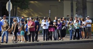 People wait in line to vote in the Arizona Presidential Primary Election at Mountain View Lutheran Church in Phoenix, Ariz., Tuesday, March 22, 2016. (David Kadlubowski/The Arizona Republic via AP) MANDATORY CREDIT