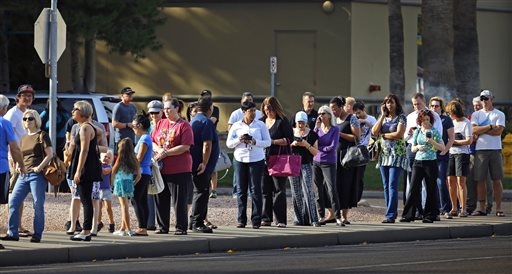 Arizona Democrats protest long poll wait for primary&nbsp;voting