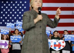 Attendees listen as Democratic presidential candidate Hillary Clinton speaks at a rally at the Riverside Ballroom in Green Bay, Wis., Tuesday, March 29, 2016. (AP Photo/Patrick Semansky)