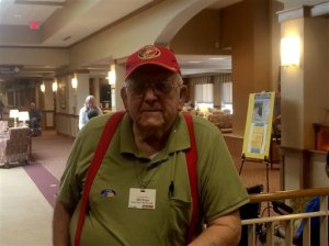Voter Bill Weise, an 86-year-old retired Marine Corps general, pauses after casting his ballot for Ted Cruz in Virginia's Republican presidential primary, Tuesday, March 1, 2016, in Springfield, Va. Weise said he opted for Cruz over Donald Trump at the last minute, though he would have voted for Ben Carson if his campaign had stayed viable. (AP Photo/Matthew Barakat)