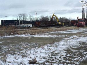 Crews work to clear the site of a 16-car Norfolk Southern freight train derailment that forced the evacuation of dozens of western New York homes after ethanol leaked from two tankers, Wednesday, March 2, 2016, in Ripley, N.Y. (Alice Waters/The Observer via AP) MANDATORY CREDIT