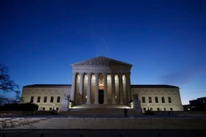 This Feb. 19, 2016 file photo shows the front of the U.S. Supreme Court building in Washington. It's business as usual at the Supreme Court this week, no matter that confirmation politics is on everyones mind in Washington. (AP Photo/Alex Brandon, File)