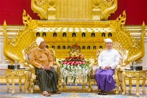 New Myanmar President Htin Kyaw, left, sits with outgoing president Thein Sein during a handover ceremony at the presidential palace in Naypyidaw on Wednesday, March 30, 2016. Htin Kyaw, a trusted friend of Nobel laureate Suu Kyi, took over as Myanmar's president Wednesday, taking a momentous step in the country's long-drawn transition toward democracy after more than a half-century of direct and indirect military rule. (Ye Aung Thu/Pool Photo via AP)