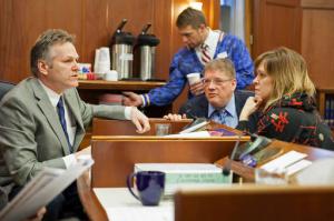 Seated from left, Republican state senators Mike Dunleavy, of Wasilla, Bill Stoltze, of Chugiak, and Mia Costello, of Anchorage, talk about proposed amendments to a bill Dunleavy proposed that restricts abortion services providers from teaching sex education in public schools, Friday, Feb. 26, 2016, in Juneau, Alaska. The bill, which also allows parents to remove their children from schools for any even event or standardized test to which the parent objects, passed the Senate. It will be reconsidered on Monday. (AP Photo/Rashah McChesney)