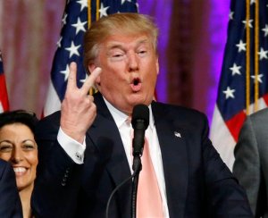 Republican presidential candidate Donald Trump speaks to supporters at his primary election night event at his Mar-a-Lago Club in Palm Beach, Fla., Tuesday, March 15, 2016.  (AP Photo/Gerald Herbert)