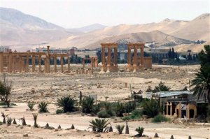 This file photo released on Sunday, May 17, 2015, by the Syrian official news agency SANA, shows the general view of the ancient Roman city of Palmyra, northeast of Damascus, Syria. AAn Iraqi military spokesman says the long-awaited military operation to recapture the northern city of Mosul from Islamic State militants "has begun." A Syrian official and a an opposition monitoring group also say Syrian government forces are trying to recapture the heart of Palmyra, controlled by the Islamic State group. (SANA via AP, File)