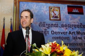 Denver Art Museum Christoph Heinrich delivers a speech during an handing over ceremony of the Torso of Rama in Phnom Penh, Cambodia, Monday, March 28, 2016. Cambodia welcomed home the 10th century stone statue, that was looted from a temple during the country's civil war, from the U.S. museum. (AP Photo/Heng Sinith)