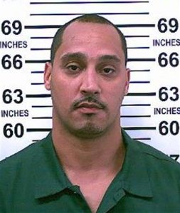 This July 2015 photo provided by the New York Department of Corrections and Community Supervision shows Richard Rosario who has served 20 years in prison for a shooting despite the fact that he gave police the names of 13 people who could vouch he was in Florida when the shooting happened. Prosecutors now plan to ask a judge Wednesday, March 23, 2016, to overturn Rosario's murder conviction and free him as they reinvestigate his case. His attorneys call it an illustration of unreliable eyewitness testimony and ineffective defense. (Department of Corrections and Community Supervision via AP)