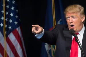 Republican presidential candidate Donald Trump speaks during a campaign event at Watertown International Airport, Saturday, April 16, 2016, in Watertown, N.Y. (AP Photo/John Minchillo)