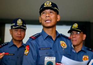 Philippine National Police Director General Ricardo Marquez reads the joint statement of the military and police on the beheading of Canadian hostage John Ridsdel of Calgary, Alberta by Muslim extremist Abu Sayyaf group in southern Philippines Tuesday, April 26, 2016 at Camp Crame in suburban Quezon city, northeast of Manila, Philippines. Ridsdel along with fellow Canadian Robert Hall, Norwegian Kjartan Sekkingstad and Filipino Marites Flor were kidnapped last September from a marina on southern Samal Island with the militants threatening to behead one of the hostages if the large amount of ransom was not paid Monday. (AP Photo/Bullit Marquez)