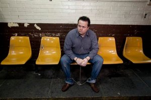 FILE - In this Sept. 3, 2012, file photo, Costa Rican citizen Alejandro Jimenez Gonzalez, a suspect in the July 2011 murder of Argentine folk singer Facundo Cabral, sits in shackles at court as he waits for his hearing in Guatemala City. A court in Guatemala has found Jimenez Gonzalez along with other 4 men guilty on Thursday, April 7, 2016, of the shooting death of Cabral.  (AP Photo/Moises Castillo,File)