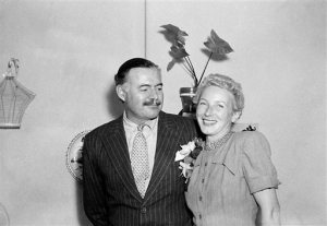 FILE - This March 14, 1946 file photo shows author Ernest Hemingway with his new wife, Mary Welsh, after their wedding in Havana, Cuba. Hemingway and John F. Kennedy never met, but the author's most extensive personal collection is housed at JFK's presidential library and is now on public display. The exhibition opening Monday, April 11, 2016, in Boston includes original manuscripts of some of his most famous literary works; letters to other major literary figures of his time; photographs and other personal mementos. (AP Photo, File)