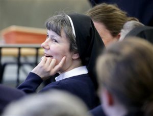 Kimberly Miller, a Philadelphia nun and teacher at Little Flower High School for Girls in the city, looks on before appearing in Washington Township Municipal Court, in Washington Township, N.J., Wednesday, April 13, 2016. Miller has been charged with driving under the influence and related charges. (Tim Hawk/NJ.com via AP, Pool)