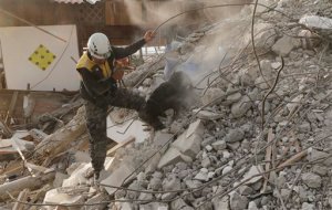A dog rescue unit searches for survivors in the rubble of an earthquake collapsed building in Pedernales, Ecuador, Tuesday, April 19, 2016. The strongest earthquake to hit Ecuador in decades flattened buildings and buckled highways along its Pacific coast, sending the Andean nation into a state of emergency. (AP Photo/Dolores Ochoa)