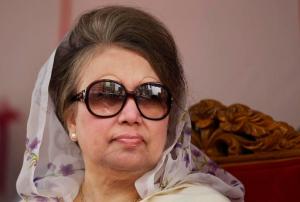 FILE-In this Jan. 5, 2016 file photo, Bangladesh's former prime minister and Bangladesh Nationalist Party (BNP) leader Khaleda Zia, looks on at a protest rally to mark the second anniversary of a general election boycotted by a major opposition alliance in Dhaka, Bangladesh. Police in Bangladesh questioned a prominent journalist and close aide of opposition leader and ex-Prime Minister Khaleda Zia over the weekend for his alleged role in a conspiracy to kidnap the only son of the current prime minister. (AP Photo/ A.M. Ahad, File)