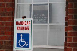 FILE- This March 1, 2012, file photo shows the office window of Medistat Group Associates in DeSoto, Texas. Dr. Jacques Roy owned Medistat Group Associates in the southern Dallas suburb of DeSoto. A federal jury deliberated for 14 hours over two days before finding Roy, guilty of eight counts of committing health care fraud, one of conspiracy, two of making a false statement and one of obstructing justice. (AP Photo/LM Otero, File)