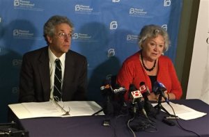 Planned Parenthood of Indiana and Kentucky Legal Director Ken Falk, left, and the organizations president Betty Cockrum talk to reporters, Thursday, April 7, 2016 in the Planned Parenthood office in downtown Indianapolis. The organization filed a lawsuit against Indiana over a controversial abortion law recently signed by Gov. Mike Pence. (AP Photo/Aric Chokey)