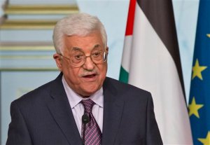 Palestinian President Mahmoud Abbas delivers a statement after a meeting with French President Francois Hollande at the Elysee Palace in Paris, France, Friday, April 15, 2016. Palestinian President Mahmoud Abbas meets French President Francois Hollande to discuss Frances recent push to restart Israeli-Palestinian peace negotiations.(AP Photo/Michel Euler)