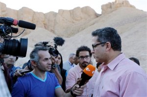 Antiquities Minister, Khaled El-Anani, talks before he enters with Egyptologists the King Tutankhamun's tomb at the Valley of the Kings in Luxor, Egypt, Thursday, March 31, 2016. A radar surveys is scheduled Thursday to confirm or deny claims that King Tutankhamun's tomb contains hidden undiscovered chambers. (AP Photo/Amr Nabil)