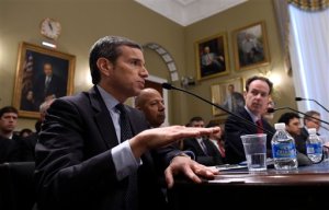 Antonio Weiss, left, counselor to Treasury Secretary Jacob J. Lew, testifies on Capitol Hill in Washington, Wednesday, April 13, 2016, before the House Natural Resources Committee during a legislative hearing on a discussion draft of the "Puerto Rico Oversight, Management, and Economic Stability Act." Weiss is joined at the table by former Washington, D.C. Mayor Anthony A. Williams, a Senior Advisory at Dentons US LLP, center, and John V. Miller, CFA Managing Director, Co-Head of Fixed Income Nuveen Asset Management, right. (AP Photo/Susan Walsh)
