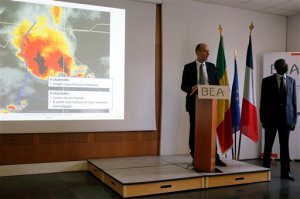 Remi Jouty, the head of France's Bureau of Investigation and Analysis for the Security of Civil Aviation (BEA) left, flanked with Mali's counterpart N'Faly Cisse delivers his speech on 2014 Air Algerie crash over Mali, blaming a mixture of mistakes for the disaster which killed 116 people, during a press conference in Le Bourget, north of Paris, France, Friday, April 22, 2016. Jouty says that the McDonnell Douglas MD-83 went down on July 24, 2014 near the rural town of Gossi after problems with its sensors probably caused by obstruction by ice crystals. (AP Photo/Francois Mori)