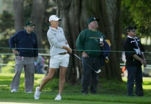 Lee-Anne Pace, of South Africa, follows her shot from the first fairway of the Lake Merced Golf Club during the third round of the Swinging Skirts LPGA Classic golf tournament Saturday, April 23, 2016, in Daly City, Calif. (AP Photo/Eric Risberg)