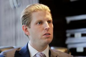 In this photo taken May 12, 2016, Eric Trump, son of Republican presidential candidate Donald Trump, responds to questions during an interview in New York. The windows of Eric Trumps office in the Trump Tower offer breathtaking views of some of Manhattans most expensive real estate. Its there the youngest of Donald Trumps adult sons is reflecting on eye-opening moments from a world far away. (AP Photo/Frank Franklin II)