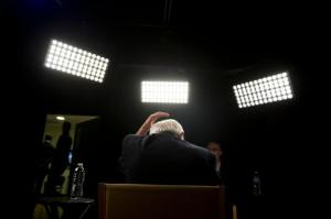 Democratic presidential candidate Sen. Bernie Sanders, I-Vt., fixes his hair before an interview with The Associated Press, Monday, May 23, 2016, in Los Angeles. (AP Photo/Jae C. Hong)