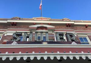 This Sunday, May 22, 2016 photo shows the newly refurbished Shuler Theater in downtown Raton, N.M. The theater is one of many theaters in rural New Mexico towns being revitalized thanks to a state initiative. A New Mexico economic development program, similar to efforts in Iowa and Illinois, seeks to save the often-forgotten theaters in small cities and towns with help on refurbishing buildings and grants for new digital projection and sound equipment. (AP Photo/Russell Contreras)