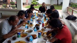 In this photo provided by the Office of Sulu Governor, Sulu Governor Abdusakur "Toto" A. Tan II, center, sits as Indonesian tugboat crewmen eat a meal after being freed in Jolo, Sulu province, southern Philippines on Sunday May 1, 2016. Abu Sayyaf militants have freed 10 Indonesian tugboat crewmen who were seized at sea in March and taken to a jungle encampment in the southern Philippines, officials said Sunday. (Office of the Sulu Governor via AP)