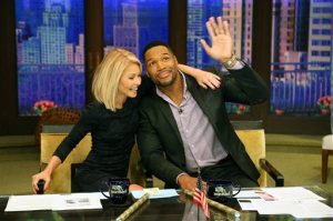 In this image released by Disney ABC Home Entertainment and Television Distribution, co-hosts Kelly Ripa, left, and Michael Strahan appear during the production of "Live! With Kelly and Michael" on Strahan's final day as co-host, Friday, May 13, 2016, in New York. (David M. Russell/Disney ABC Home Entertainment and Television Distribution via AP)