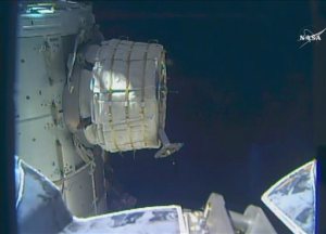 In this frame from NASA TV, a new experimental room at the International Space Station partially inflates Thursday, May 26, 2016. NASA released some air into the experimental inflatable room, but put everything on hold when problems cropped up. (NASA TV via AP)