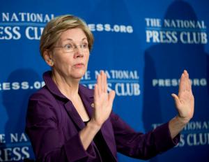 FILE - In this Nov. 18, 2015, file photo, Sen. Elizabeth Warren, D-Mass. gestures before speaking at the National Press Club in Washington. Warren has taken to Twitter to attack what she calls presumptive Republican presidential nominee Donald Trumps toxic stew of hatred & insecurity. She put out a series of tweets Tuesday night as results from the GOP primary in Indiana left Trump as the overwhelming favorite to become the GOP nominee. (AP Photo/Pablo Martinez Monsivais, File)