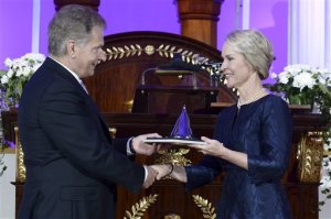 US biochemical engineer Frances Arnold, right, receives her Millennium Technology Prize 2016 from Finnish President Sauli Niinisto at the awards ceremony in Helsinki, Finland, on Tuesday, May 24, 2016. Arnold has won this year's $1.2 million Millennium Technology Prize for discoveries in "directed evolution," which has helped sustainable development and clean technology become available in many areas of industry. (Heikki Saukkomaa/Lehtikuva via AP) FINLAND OUT