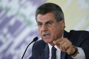 Brazil's Planning Minister Romero Juca gives a press conference about a leaked phone recording at his offices in Brasilia, Brazil, Monday, May 23, 2016. Brazils interim government came under fire on Monday, as a secret recording emerged of  Juca discussing an alleged agreement to push for President Dilma Rousseffs impeachment to stall a massive corruption probe that has engulfed much of the South American nations political class. Juca said his comments had been taken out of context.  (AP Photo/Eraldo Peres)