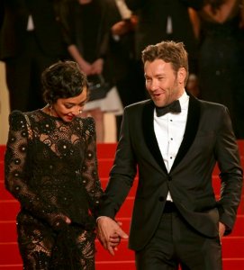 Actress Ruth Negga, left and actor Joel Edgerton, pose for photographers after leaving the screening of the film Loving at the 69th international film festival, Cannes, southern France, Monday, May 16, 2016. (AP Photo/Joel Ryan)