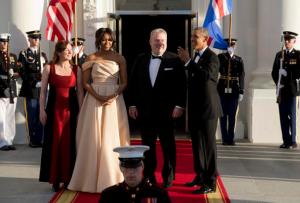 President Barack Obama and first lady Michelle Obama stand with Iceland Prime Minister Sigurdur Ingi Johannsson and his wife Ingibjorg Elsa Ingjaldsdottir as they arrive at the North Portico of the White House in Washington, Friday, May 13, 2016, for a State Dinner. (AP Photo/Carolyn Kaster)