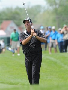Rocco Mediate watches his shot on the 14th hole Thursday, May 26, 2016, during the first round of the Senior PGA Championship golf tournament at Harbor Shores in Benton Harbor, Mich. (Don CampbellThe Herald-Palladium via AP)