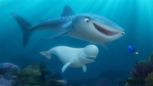 This image released by Disney shows the characters Destiny voiced by Kaitlin Olson, top, Bailey, a beluga whale voiced by Ty Burrell and Dory, voiced by Ellen DeGeneres, in a scene from "Finding Dory." (Pixar/Disney via AP)