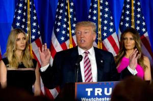 Republican presidential candidate Donald Trump is joined by his daughter Ivanka, left, and wife Melania as he speaks during a news conference at the Trump National Golf Club Westchester, Tuesday, June 7, 2016, in Briarcliff Manor, N.Y. (AP Photo/Mary Altaffer)